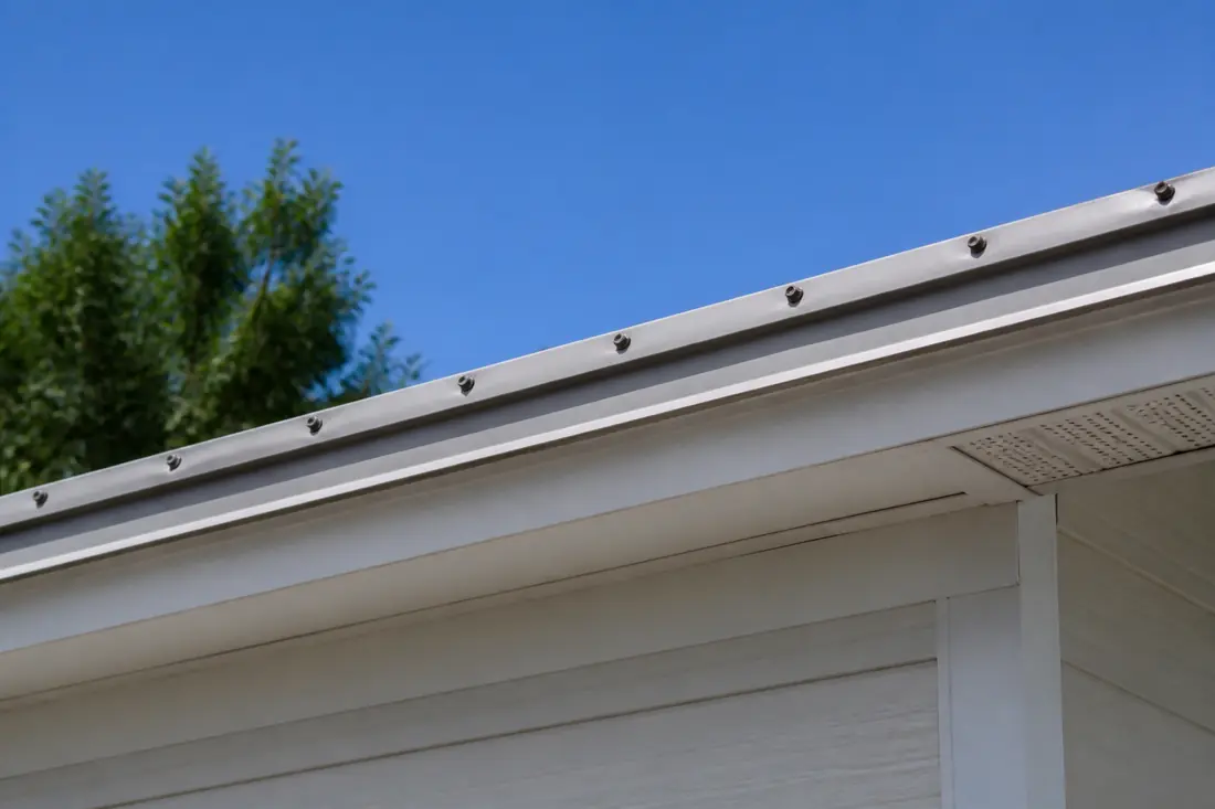 The edge of a manufactured home roof where the covering meets the eave